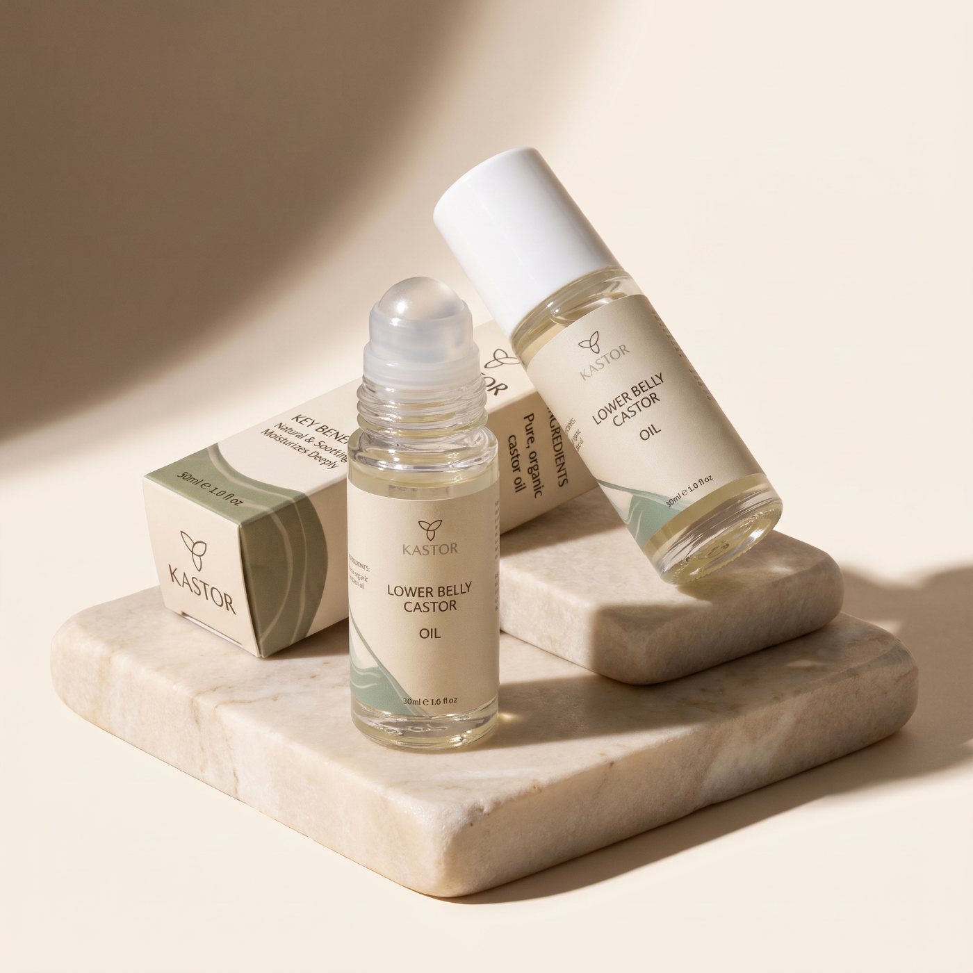 Two Kastor rollers and the carton on marble